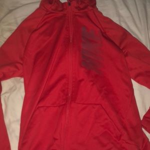 An extra large red Nike zip up hoodie